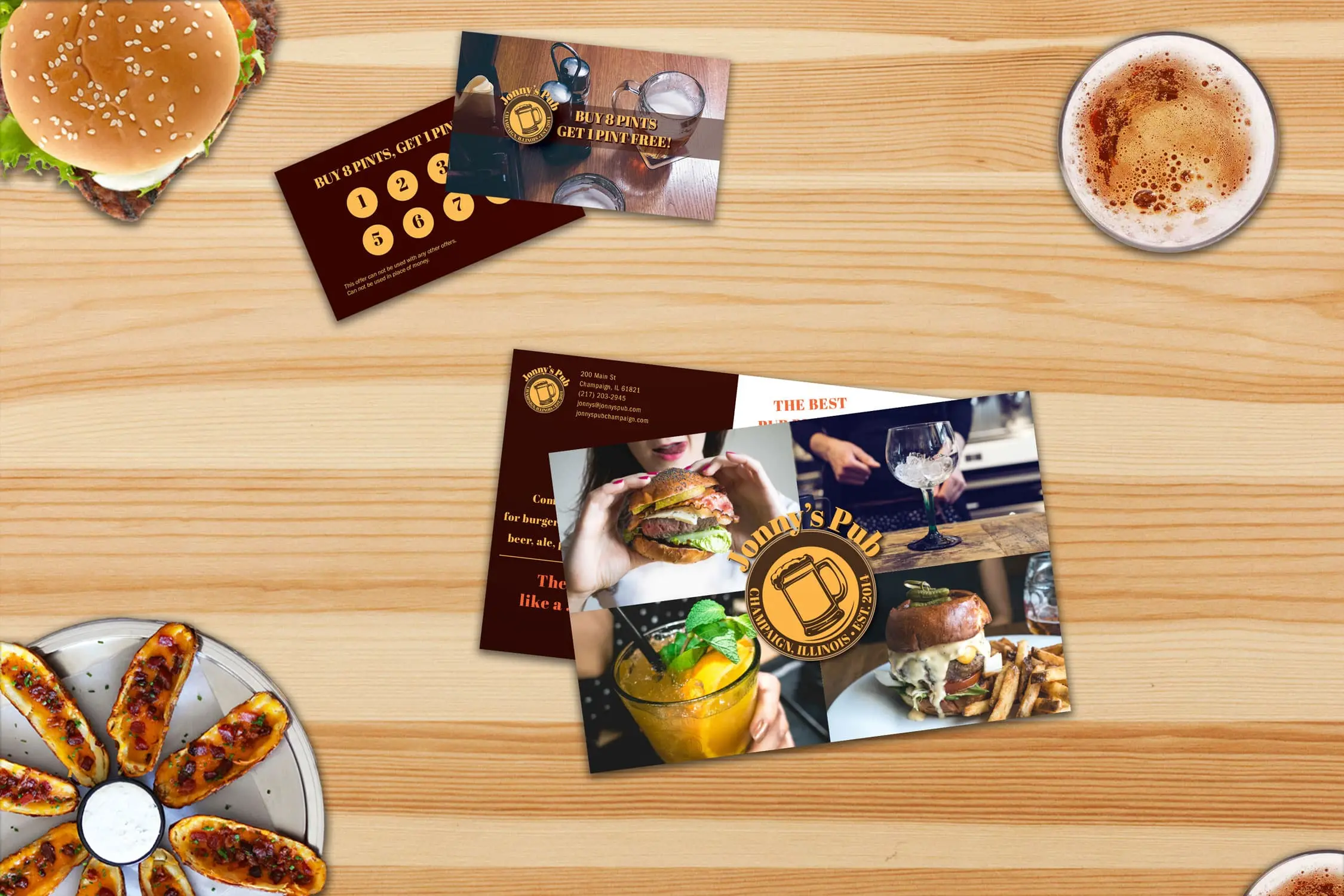 jonny's pub punch cards and postcards with burgers, beer, and potato skins on a table